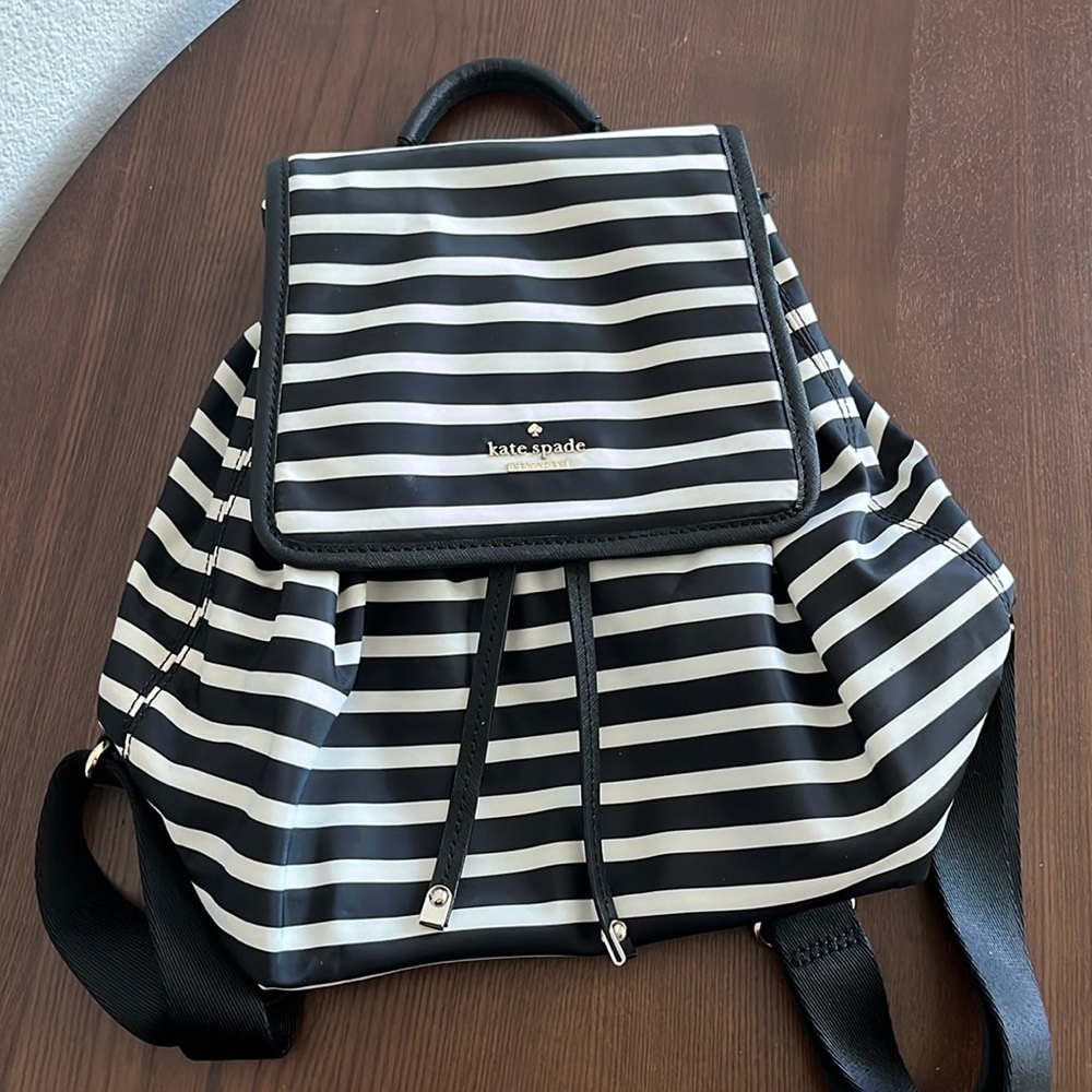 Black and white striped Kate Spade nylon drawstring backpack purse